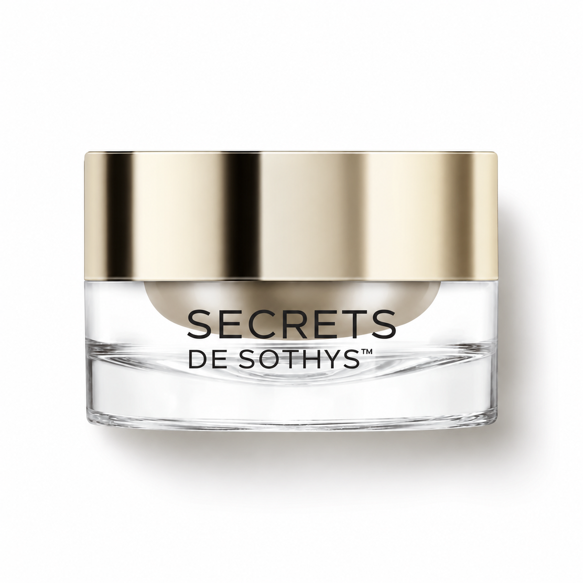 Crème yeux-lèvres en pot rechargeable transparent, avec couvercle doré et marquage Secrets de Sothys.
